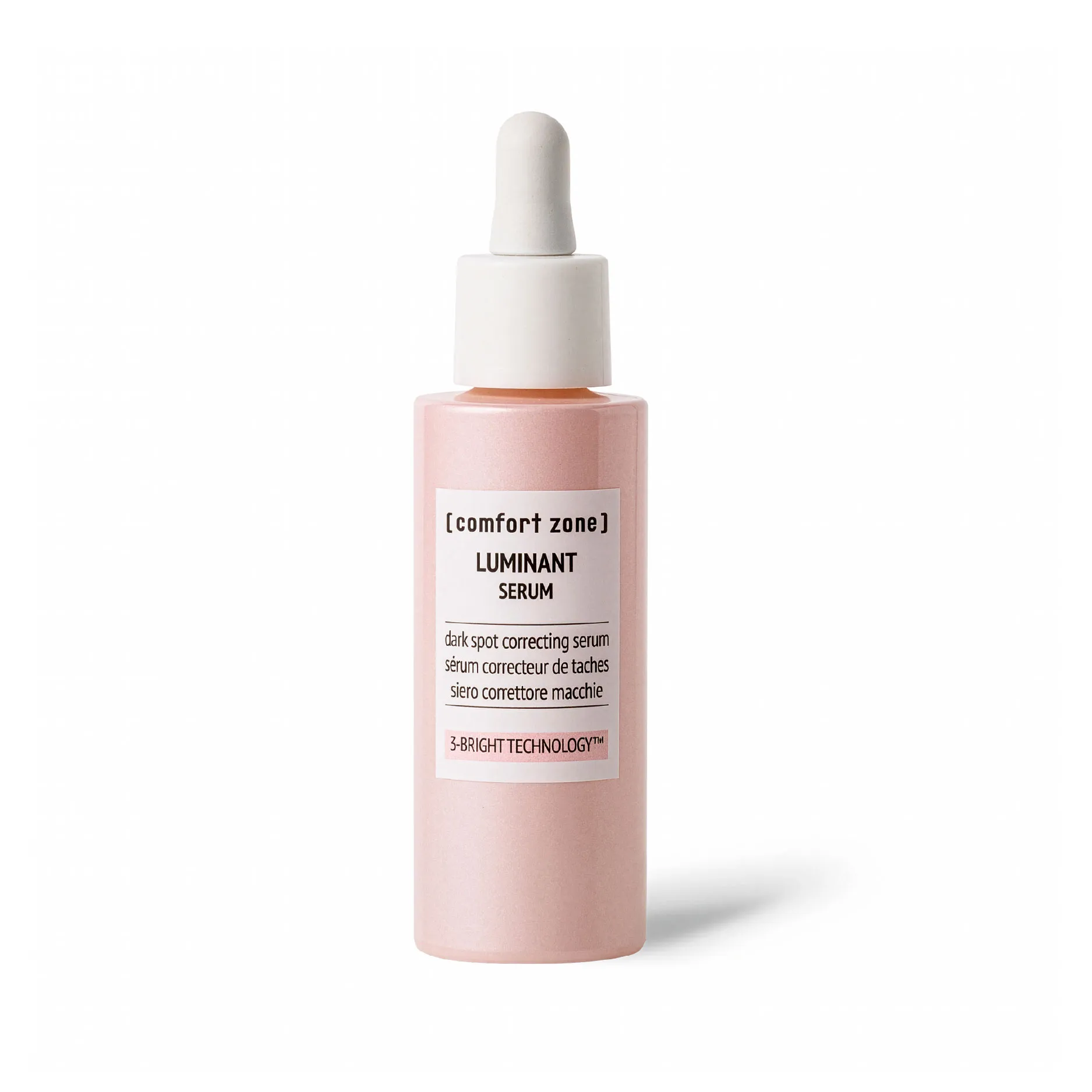 A bottle labeled &ldquo;LUMINANT SERUM&rdquo; with &ldquo;[comfort zone]&rdquo; on a light pink dark-spot correcting serum, shown on a white background.
